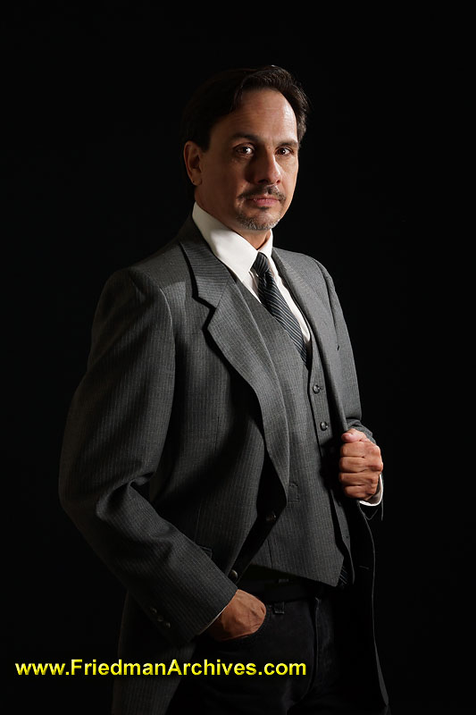 serious,balderdash,distinguished,portrait,suit,grey,wireless flash,